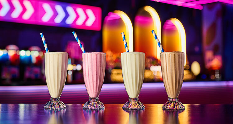 Four different flavoured milkshakes