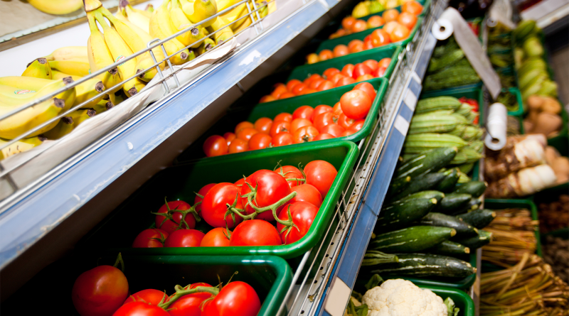 Close-up of rows of different fruit and veg in a store to support UK supermarket article