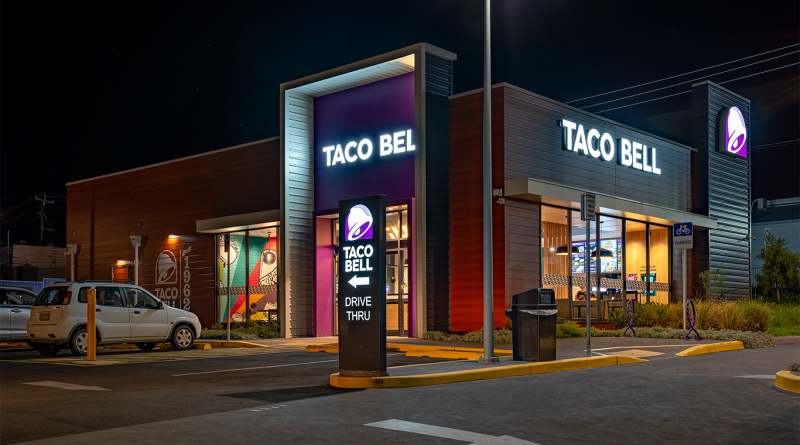 Taco Bell store open at night with drive-thru to support Baja Blast Gelato article