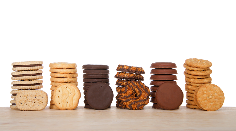 Girl Scout Cookies lined up in a row to support Toast-Yay! and S'mores retirement article