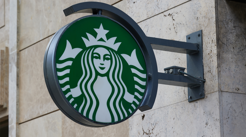 Starbucks logo outside building to support menu reduction article