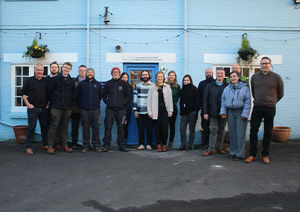 Yapp Brothers staff outside the shop