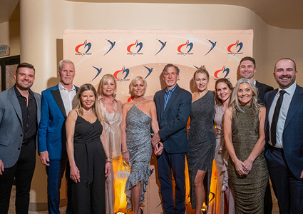  a group of people attending an event