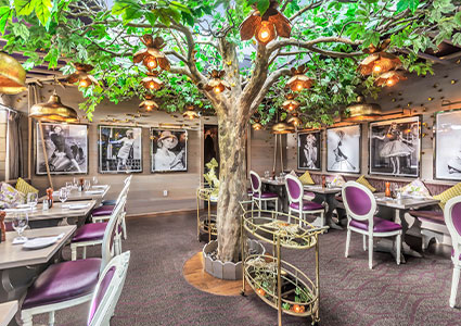the Sycamore Room inside the Autograph Brasserie restaurant located in Wayne, Pennsylvania.