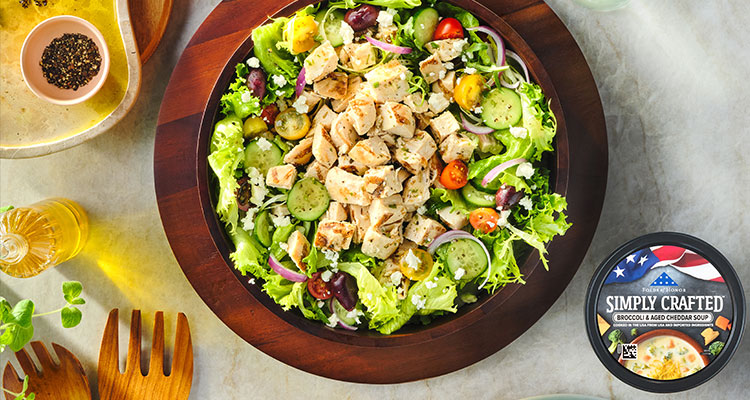 a meal pairing consisting of Simply Crafted Broccoli & Aged Cheddar Soup and a fresh Mediterranean-style chicken salad.