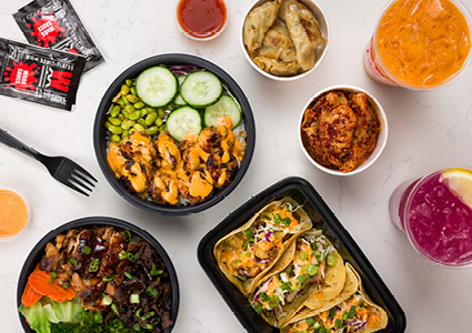 a spread of healthy, Asian-fusion food items from WaBa Grill