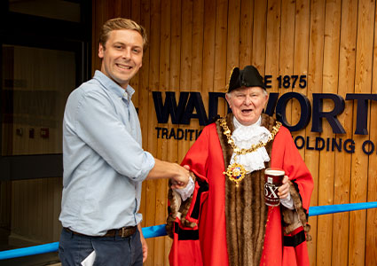 This photo captures the grand opening of the Wadworth Brewery Shop in Devizes, which took place on Friday, May 2, 2025