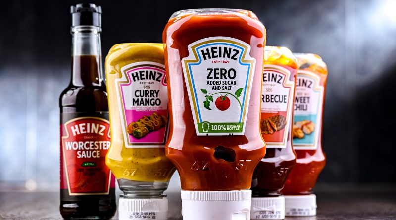 Kraft Heinz products displayed on grocery shelves as the company invests in marketing, hiring and innovation to drive growth.