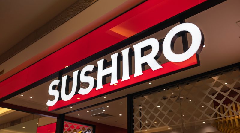 Interior rendering of a modern conveyor belt sushi restaurant opening in Times Square, New York.
