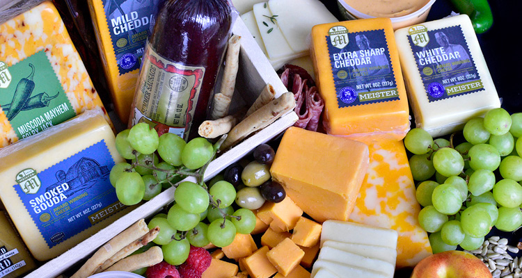 an assortment of gourmet foods from Meister Cheese