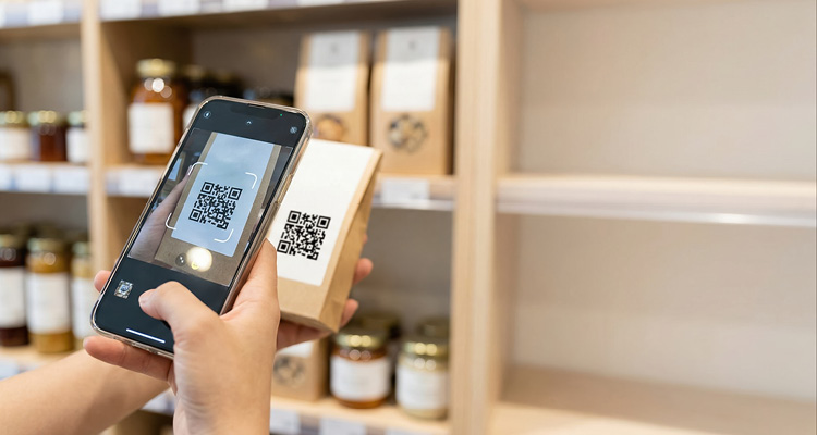 a person using a smartphone camera to scan a QR code printed on a product package