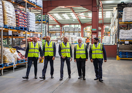 Management team walking through Surya Foods Harwich warehouse