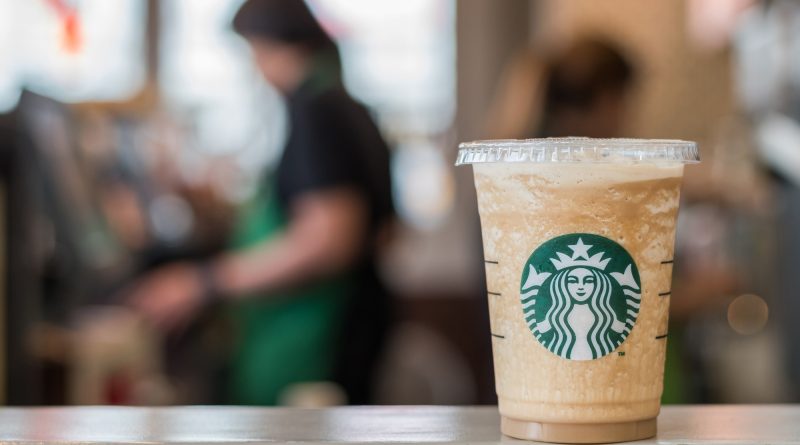 Starbucks coffeehouse representing the company’s North American store closure and restructuring strategy
